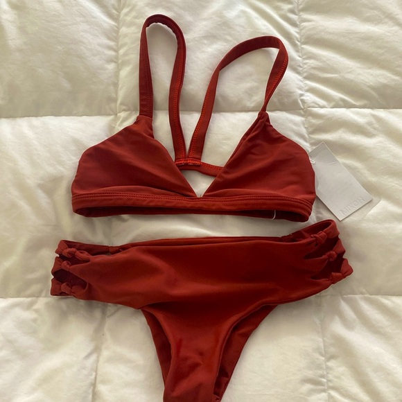 Maroon two piece with tags. Excellent condition. Just too tight on me. - Picture 1 of 6